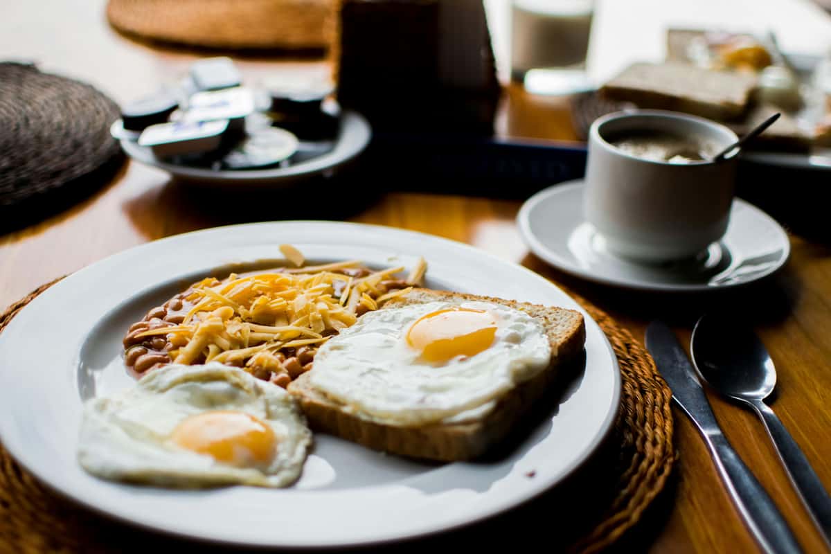 toast with eggs and baked dish on the side