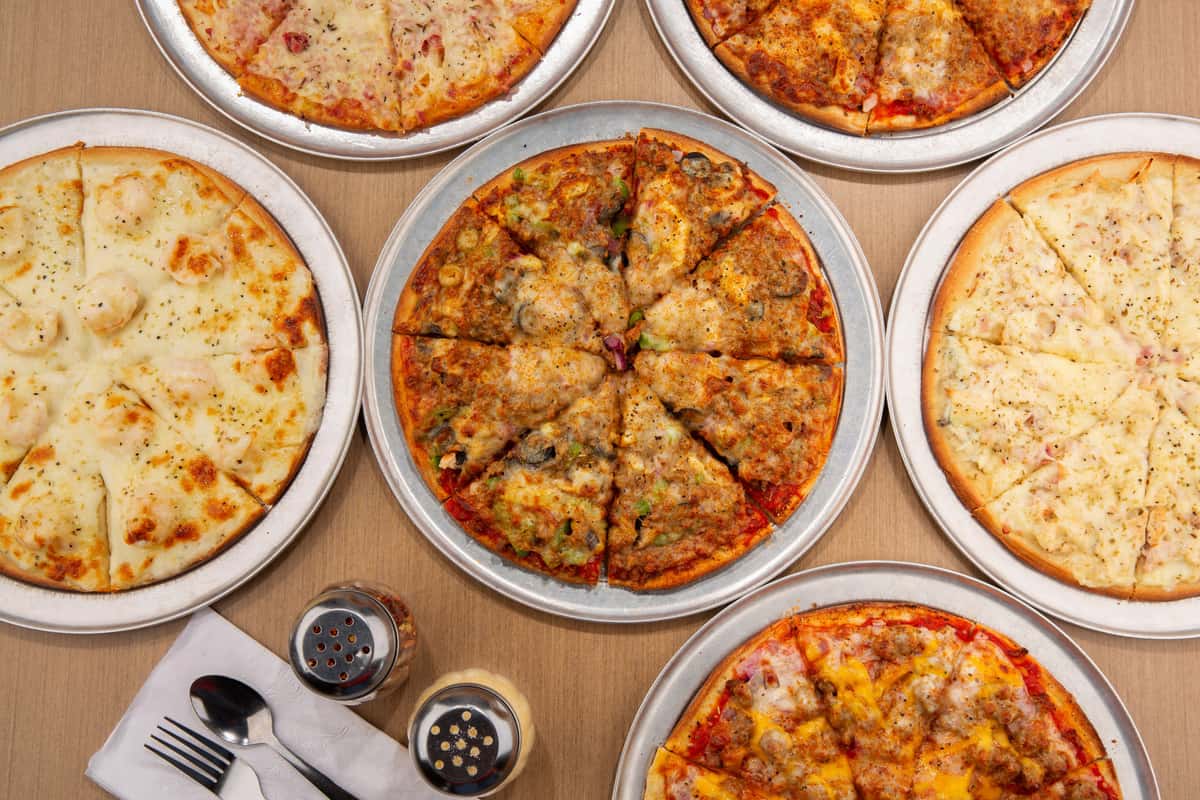 Overhead view of specialty pizzas at The Gaslight Pizza & Grill in Huntingburg, Indiana