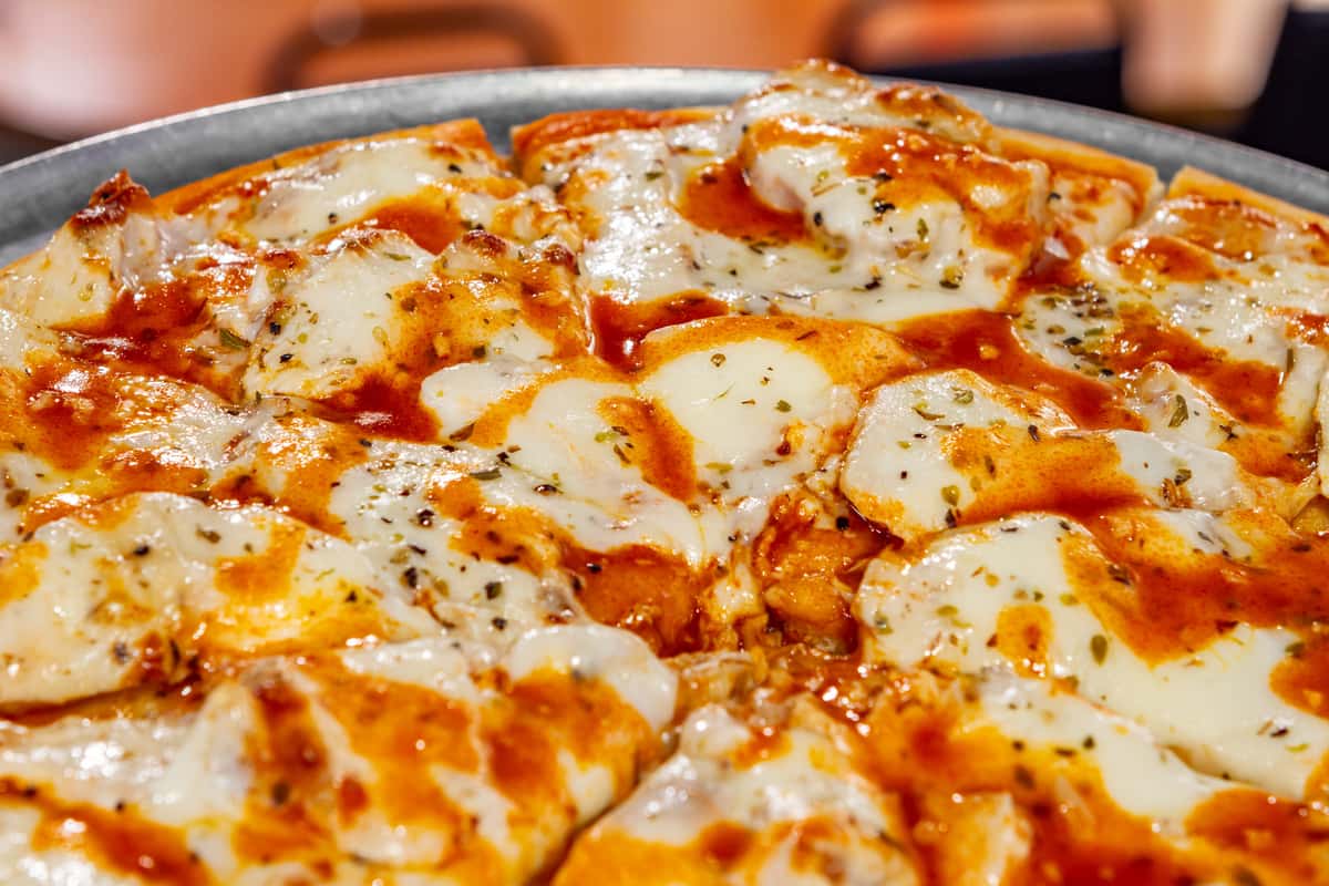Buffalo chicken pizza with grilled chicken, melted cheese, and buffalo sauce drizzle at The Gaslight Pizza & Grill in Huntingburg, Indiana