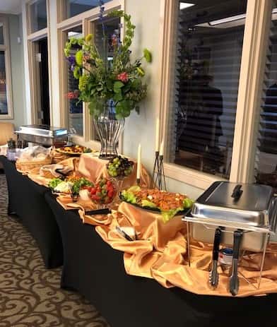 A catering table filled with a variation of food