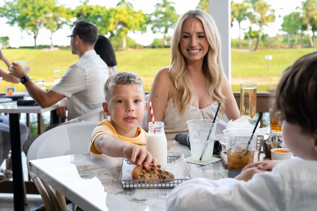 boy and women eating cookies