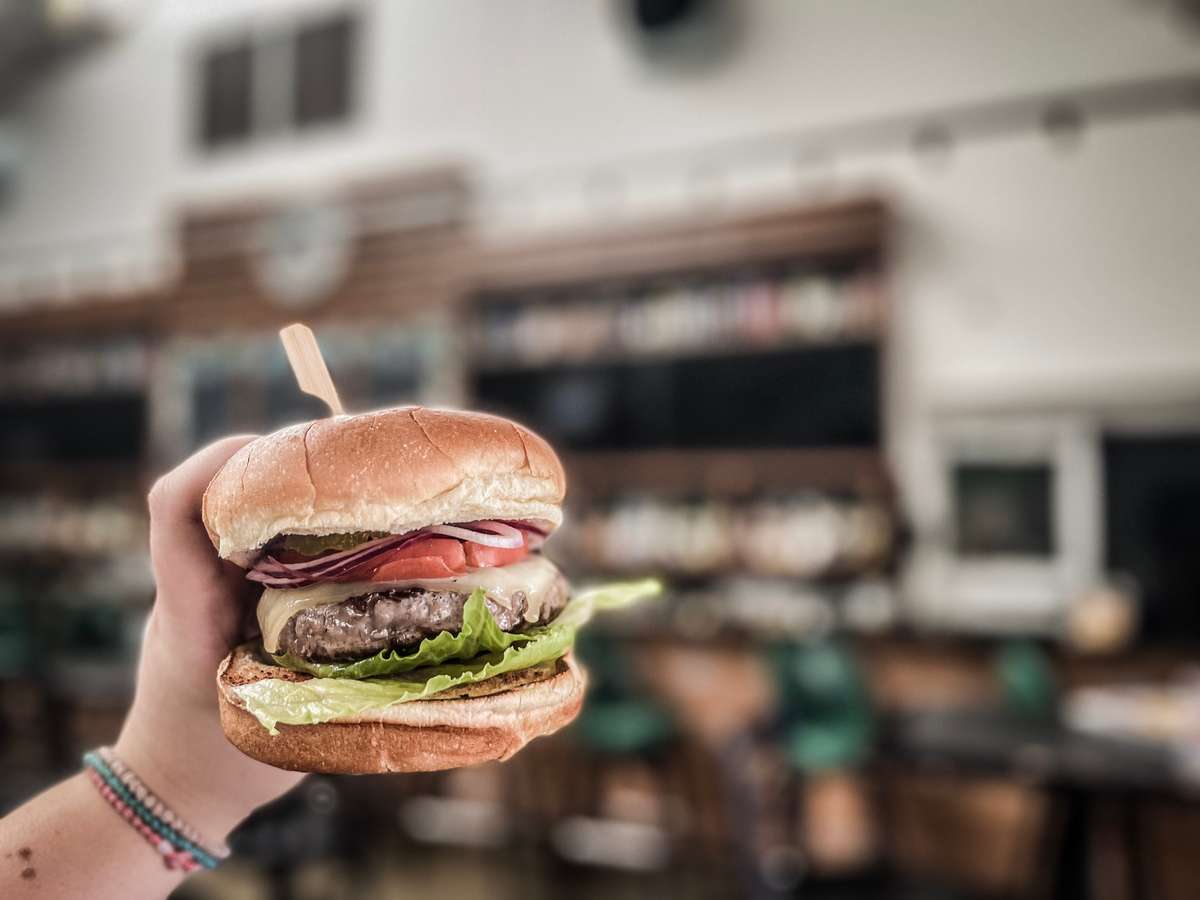 holding a burger
