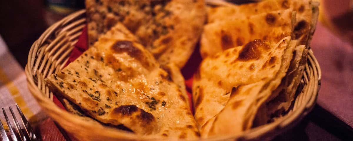 basket of cooked flat breads
