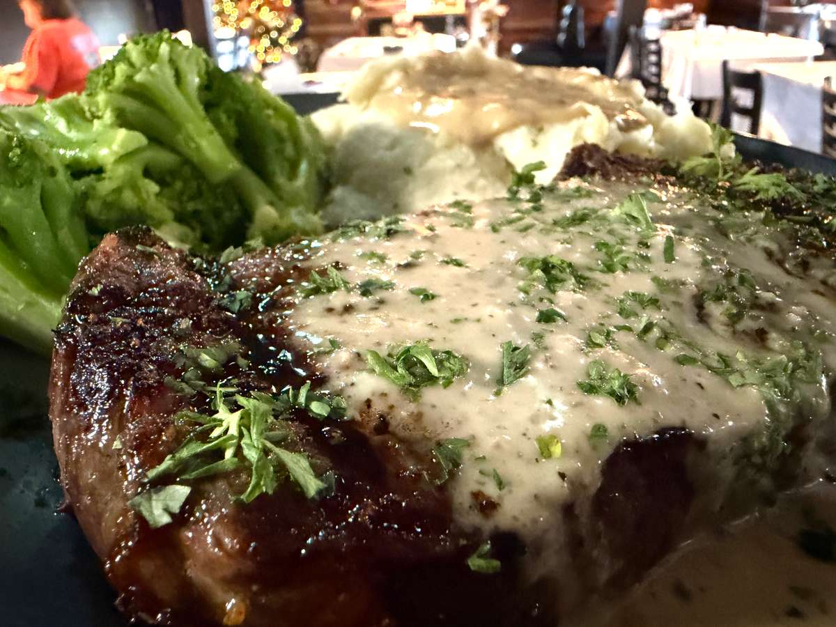 This cut of aged green barn prime strip steak is a house classic. The New York has the best balance of tenderness and is full-flavored. Finished with Bourbon Cream Sauce.
