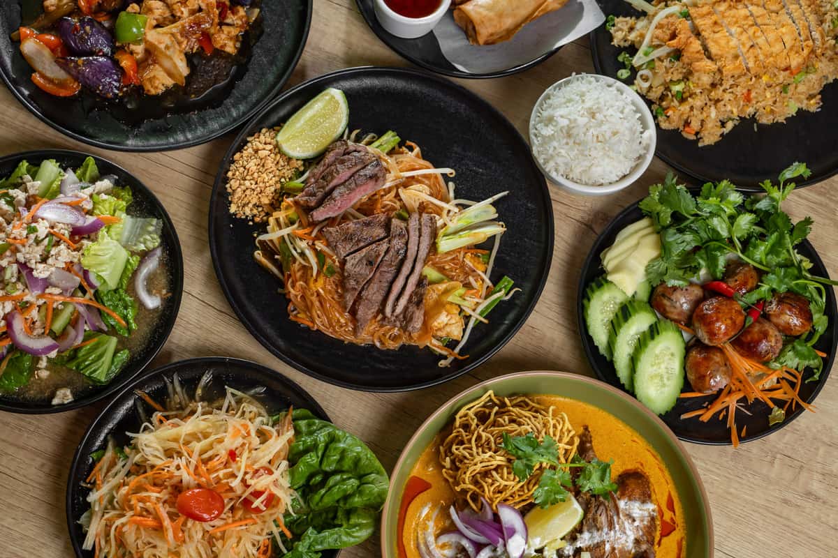 An array of different Thai dishes shot in top view
