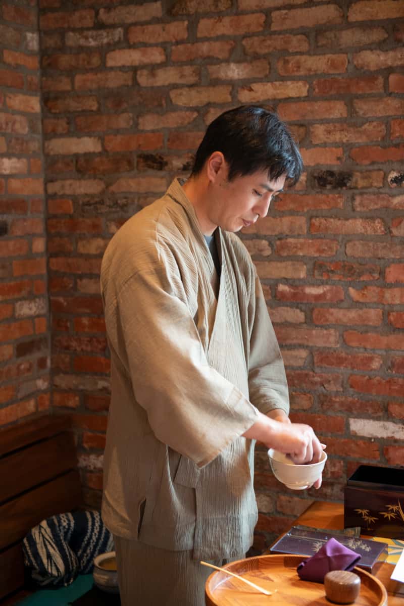 Preparing the cup for tea at Japanese tea ceremony