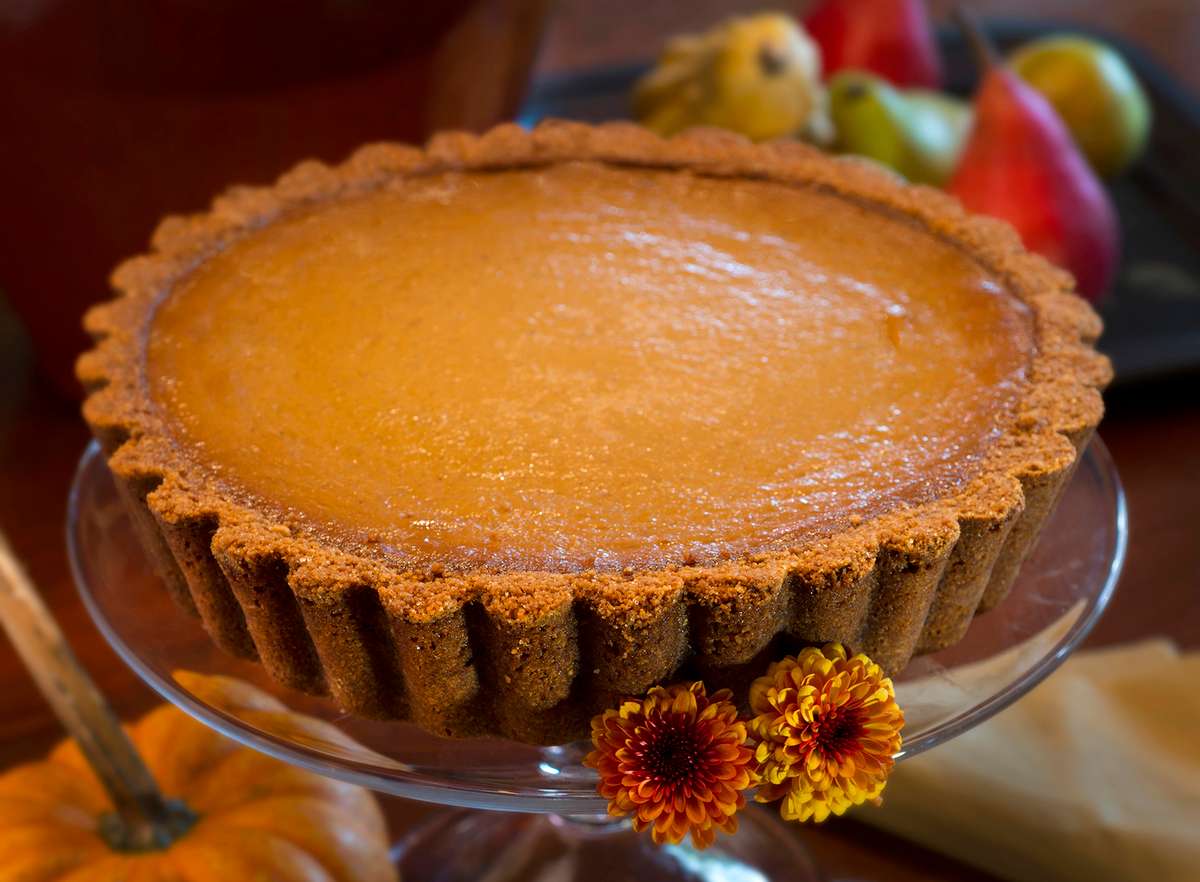 Urth Caffé Classic Pumpkin Pie on stand -- cropped