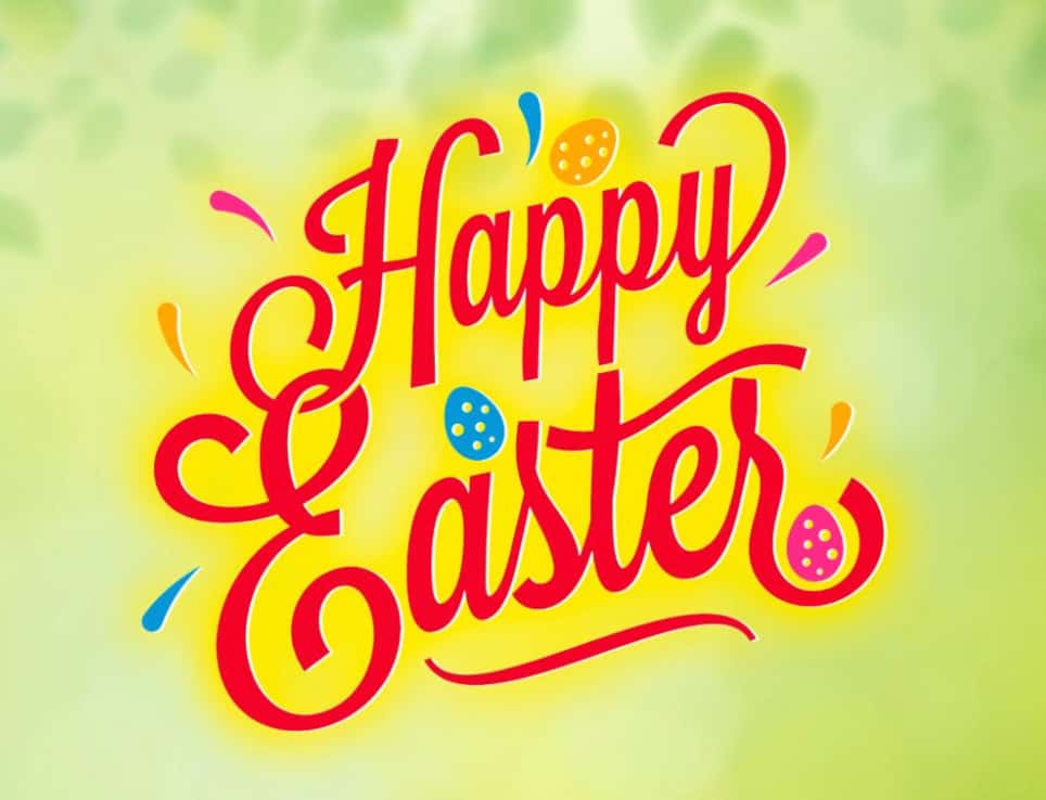 Happy Easter text in a festive red script font angled upwards from left to right. Three small colorful Easter eggs adorn the text. There is a warm yellow glow behind the type which fdes to a light yellow green at the edges of the image.