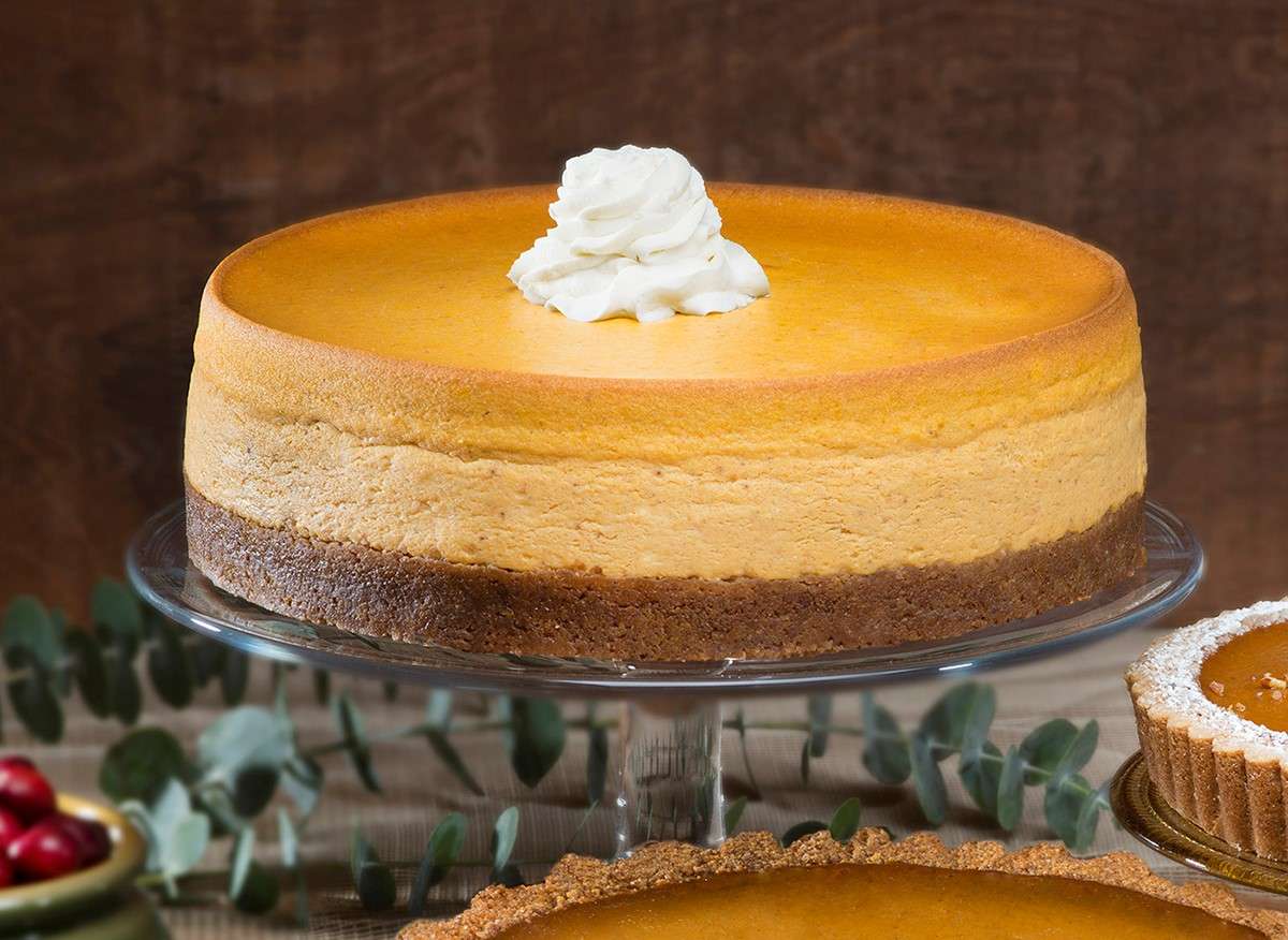 Whole Pumpkin Cheesecake on cake pedestal