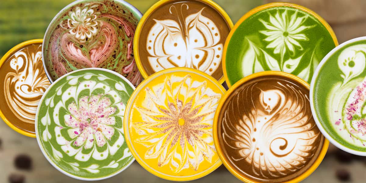 Eight colorful latte designs looking straight down – yellow, matcha green and light and dark espresso colors