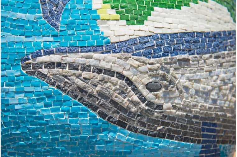 close up of mosaic detail of one of the whales