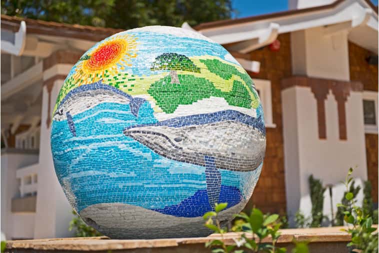 completed mosaic globe fountain with swimming whales