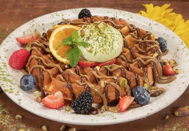 Chocolate Pistachio Waffle golden brown & Drizzled with Urth Pistachio Butter and Urth Chocolat Hazelnut Cream