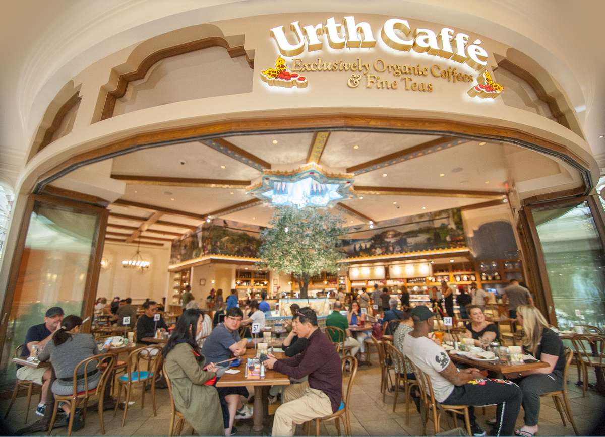 Urth Caffe at the Wynn Plaza Las Vegas - view from front showing guests dining on the walkway out front and into the cafe