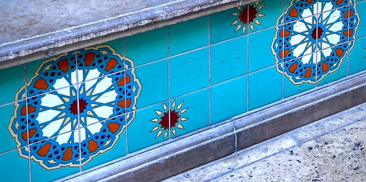 Tiled mosaic in fountain area - Urth Pasadena