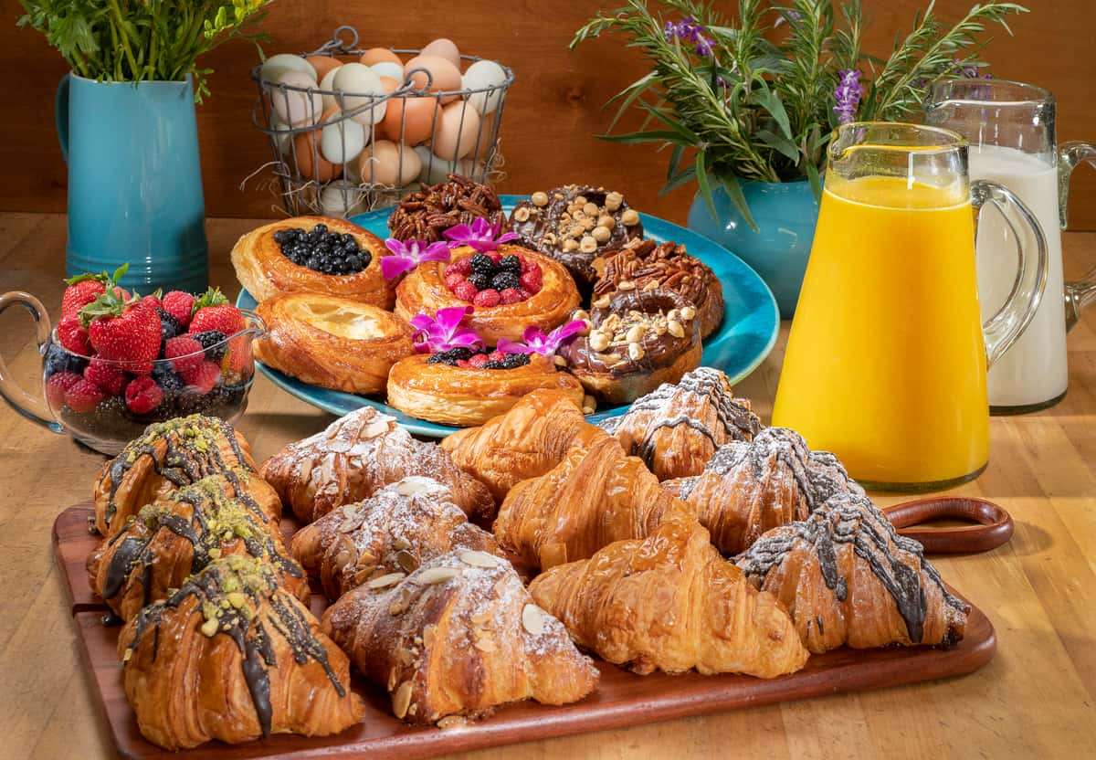 Croissants pastries and orange juice