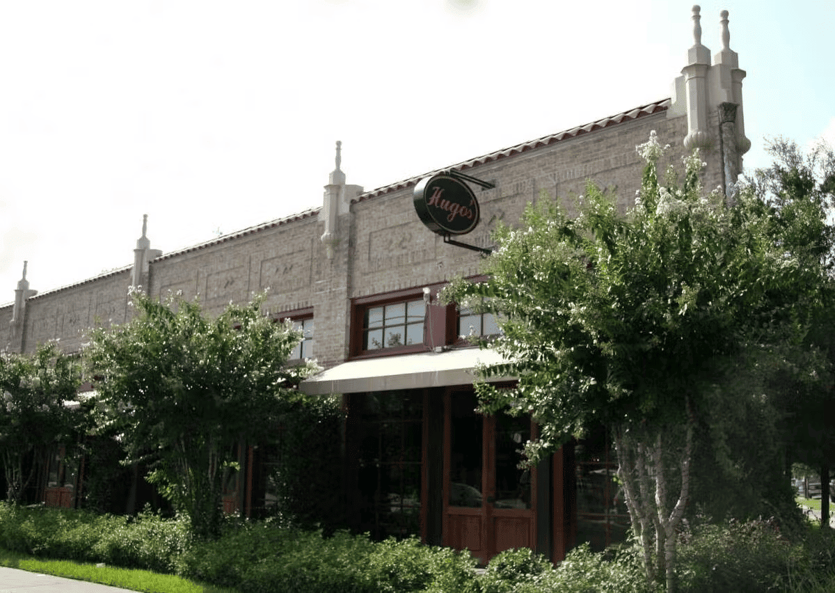 Exterior view of Hugo's restaurant featuring the welcoming entrance and classic architectural design.