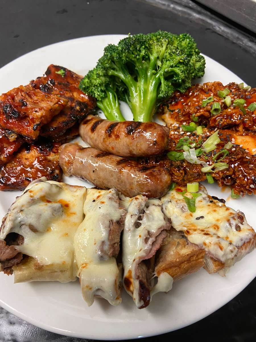 Sausage and meat with potatoes and a sauce