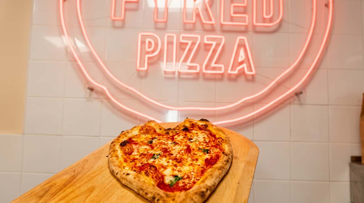 Heart Shaped Pizza and Fyred Sign