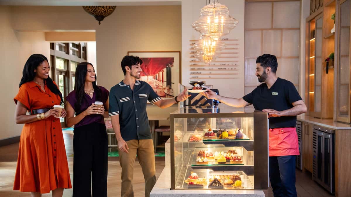 Getting food and drinks from The Cafe at The Alfond Inn