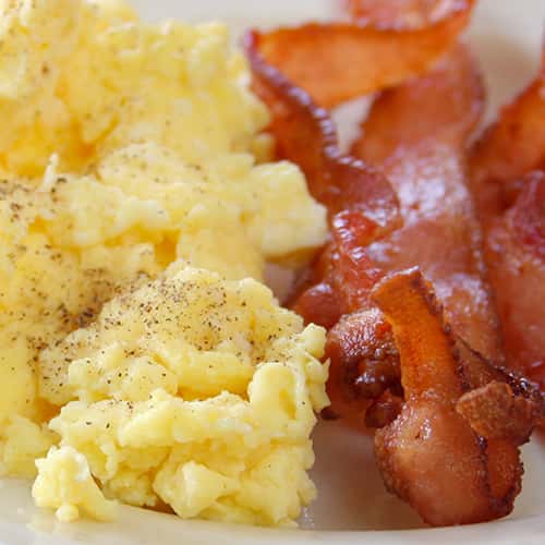 scrambled eggs and bacon strips