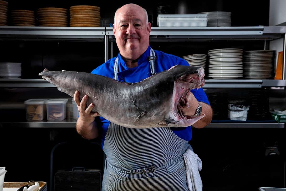 man holding fish