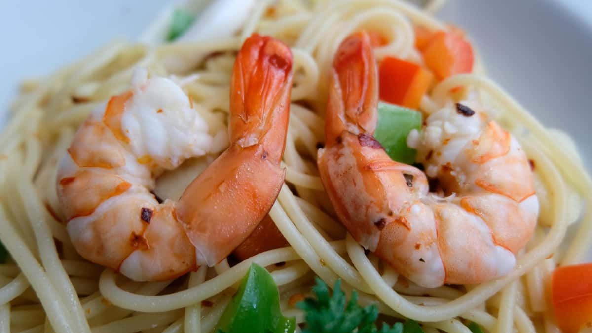 Spaghetti with shrimp and fresh vegetables in a light sauce at Amante's Italian Restaurant