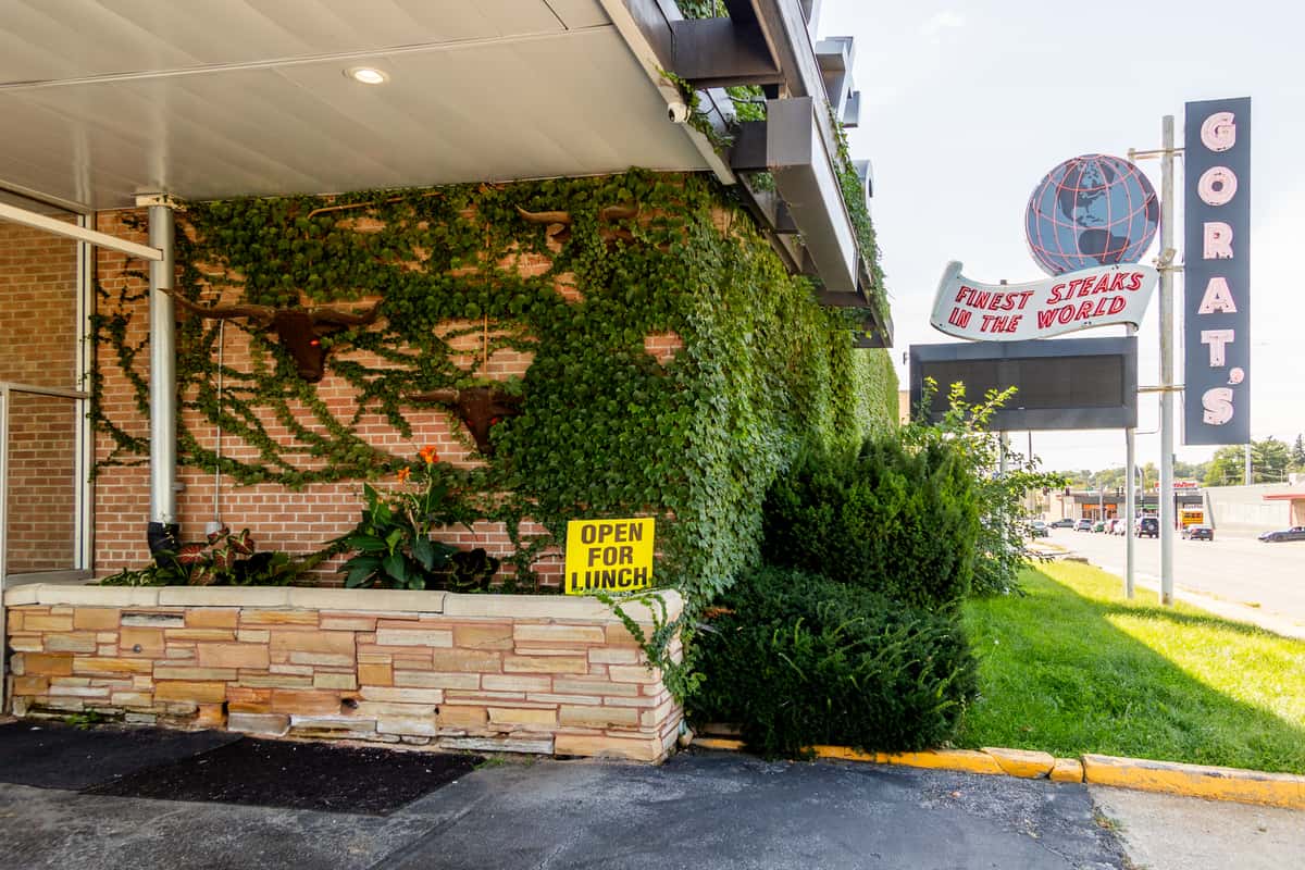 Entrance and iconic roadside sign at Gorat's Steak House on Center Street in Omaha