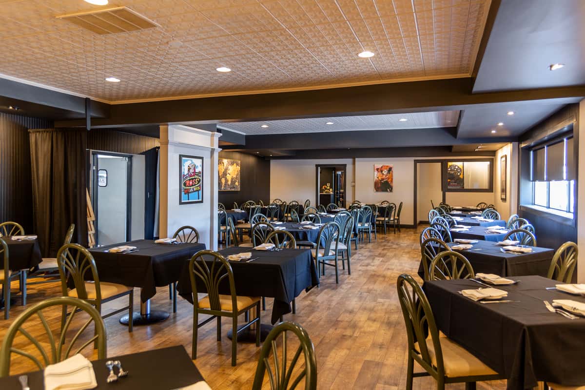 Classic dining room with neatly set tables at Gorat's Steak House in Omaha, Nebraska