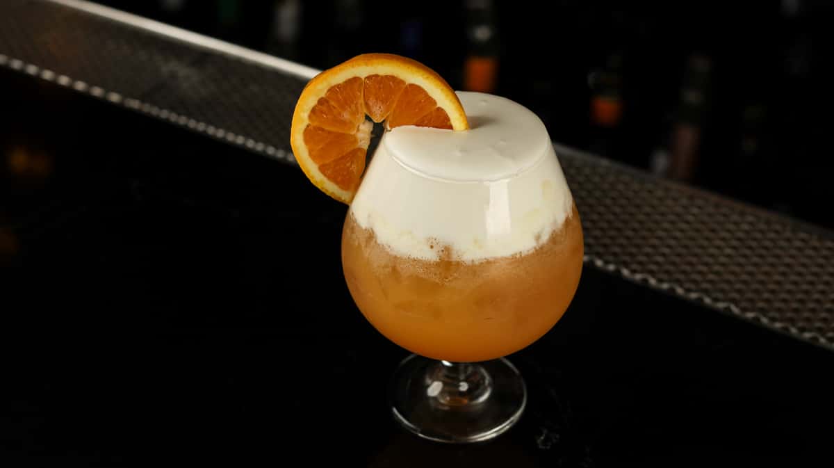 Orange and vanilla meet vodka and a dreamy vanilla soft top
