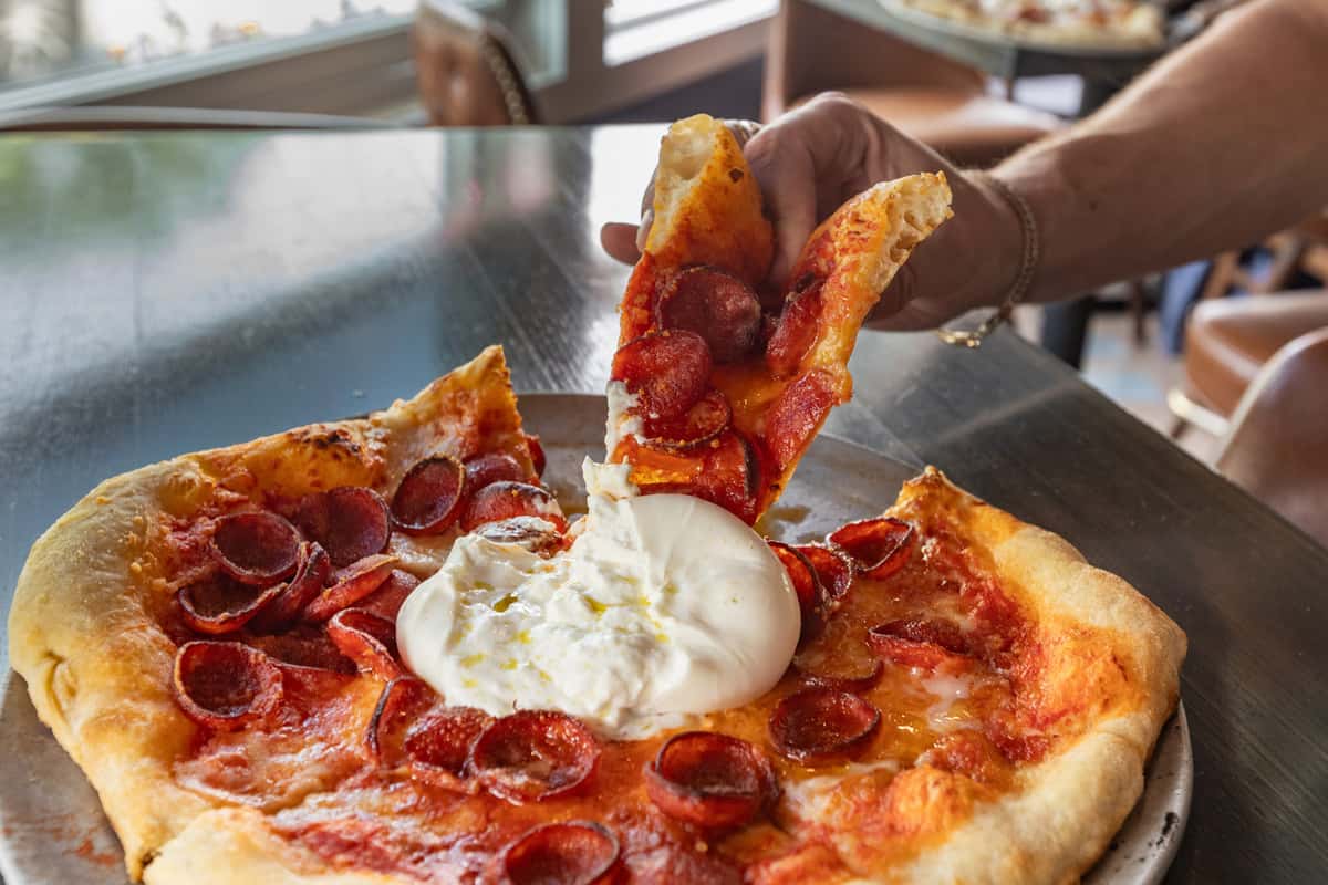 Pepperoni Pizza with a Burrata Ball.