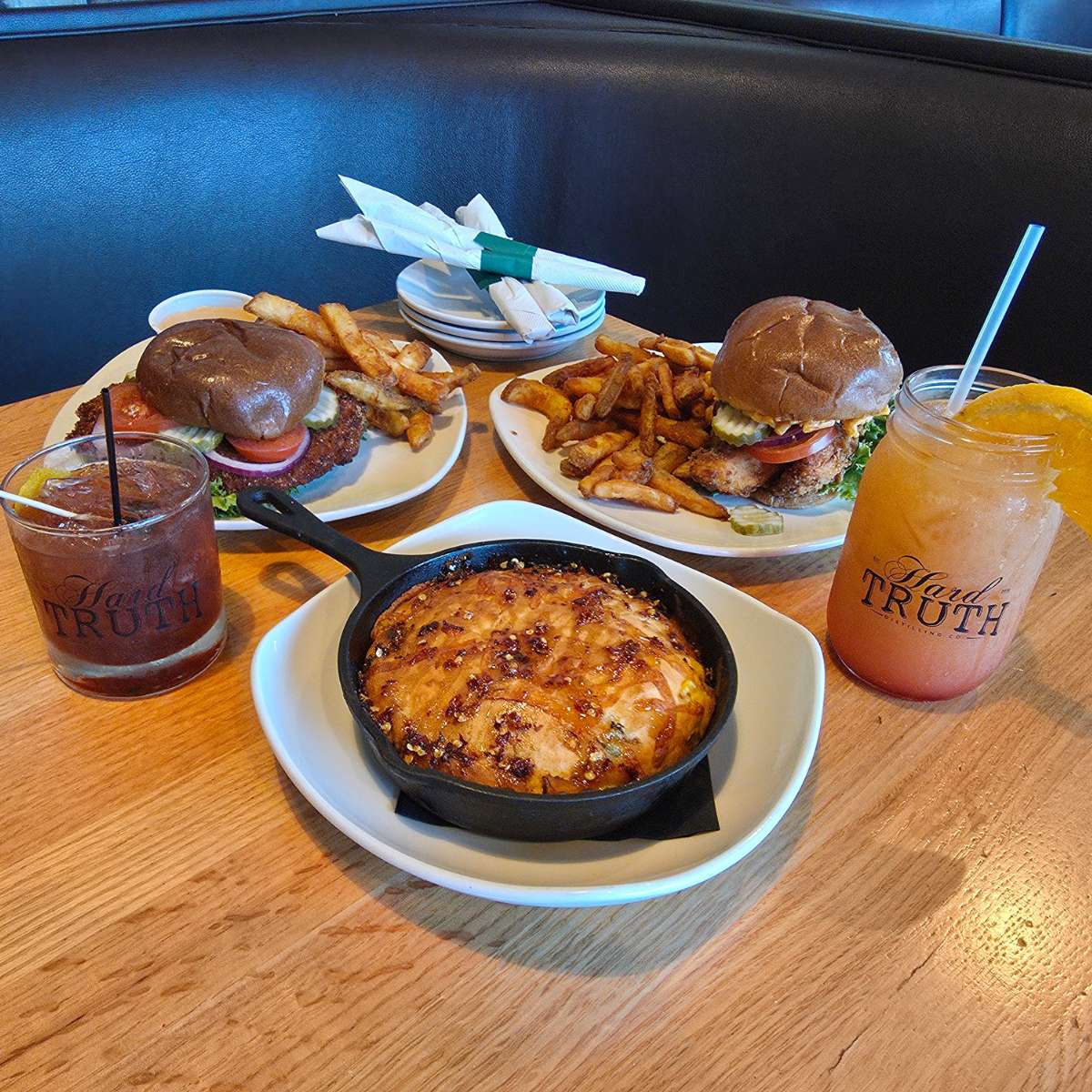 tenderloin, pimento chicken sandwich, hot honey jalapeno cornbread, old fashioned, and bahama mama