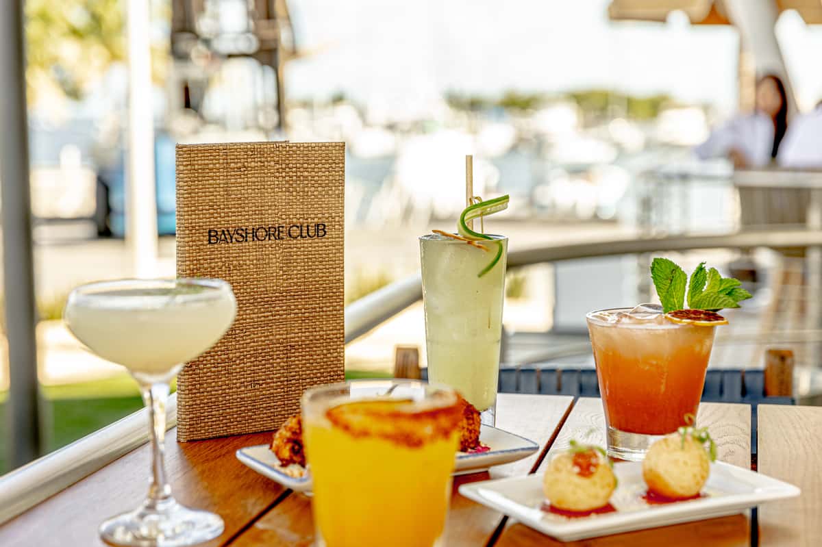Cocktails and appetizers served at Bayshore Club waterfront restaurant