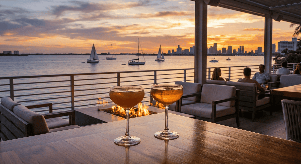 Sunset cocktails at a waterfront bar overlooking Biscayne Bay.