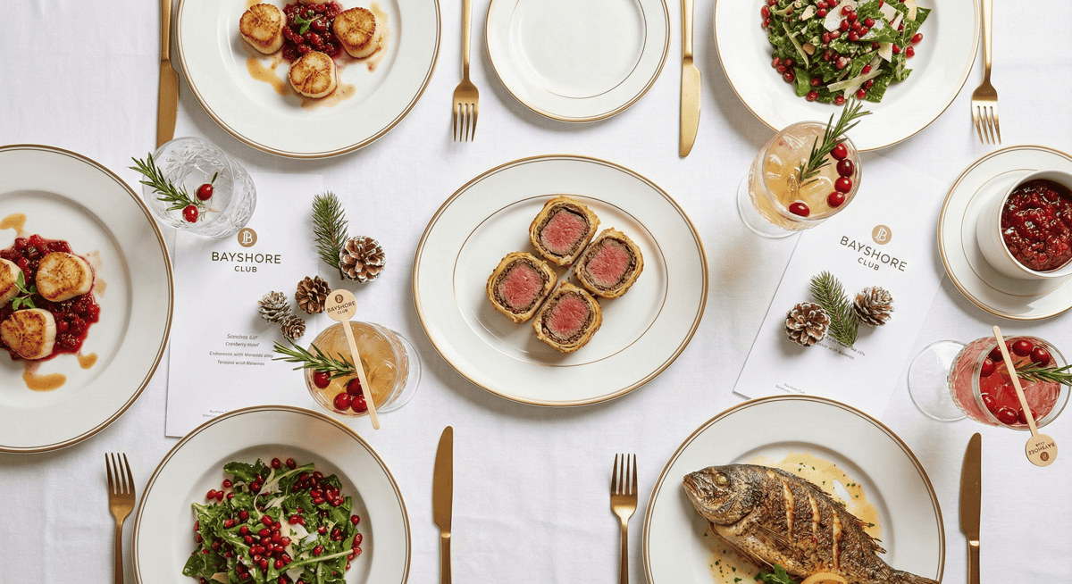 Gourmet holiday food and cocktail spread from Bayshore Club Miami's corporate catering.