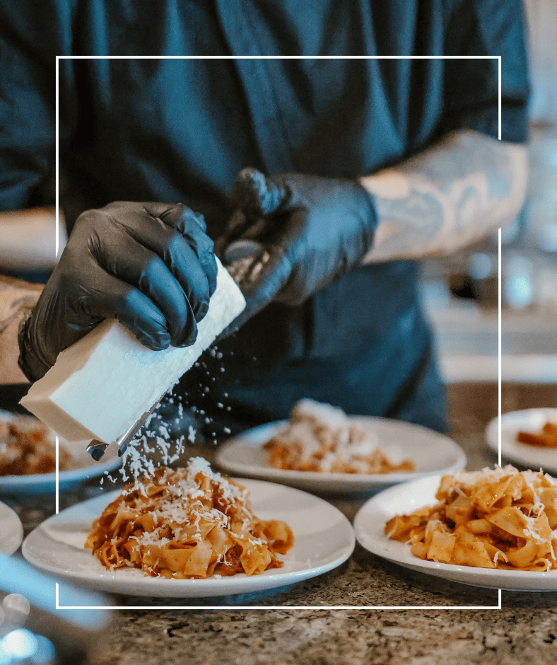 GRATING PARM ON CATERED PASTA DINNER