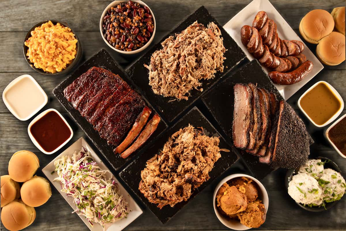 Catered trays of bbq and sides for a party