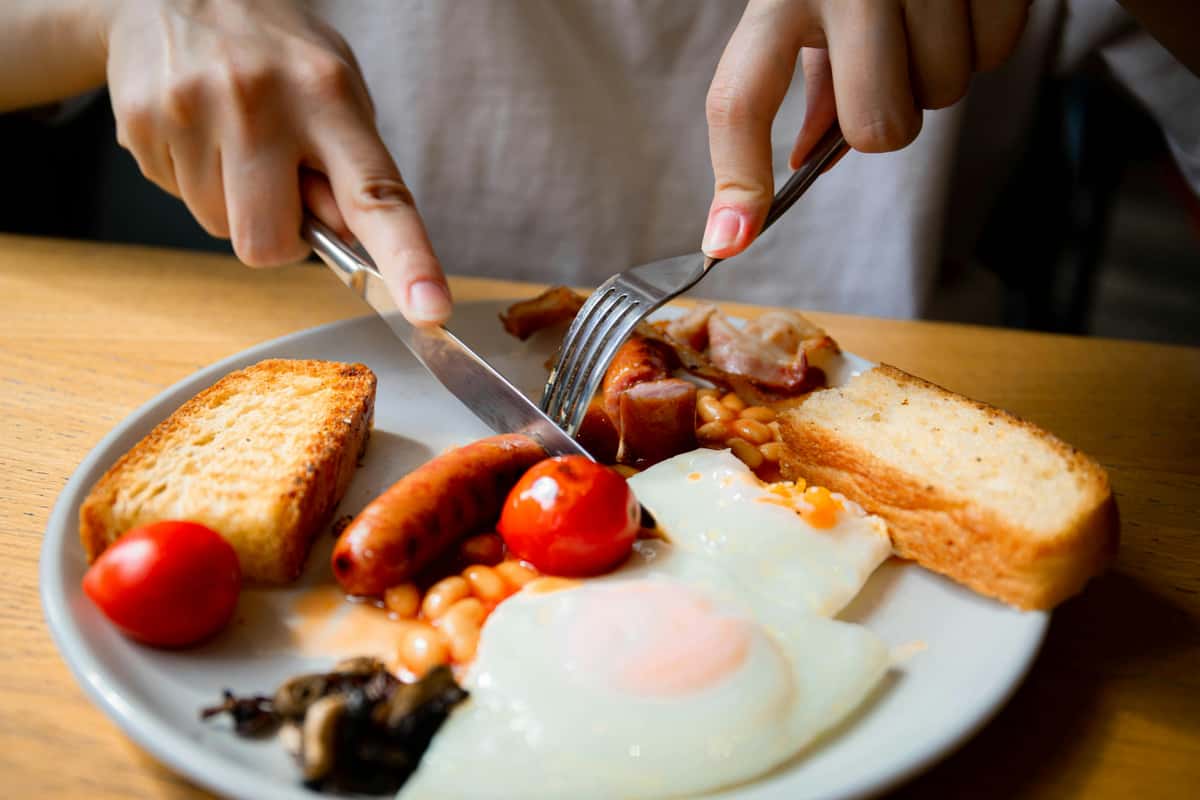 breakfast plate with eggs and sausages