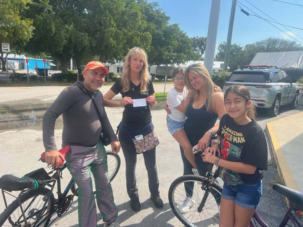 customers with bikes & owner