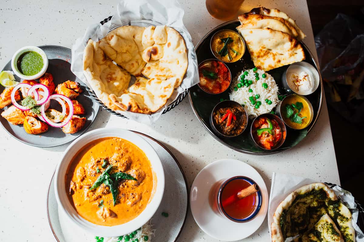 A variety of Indian dishes on a table
