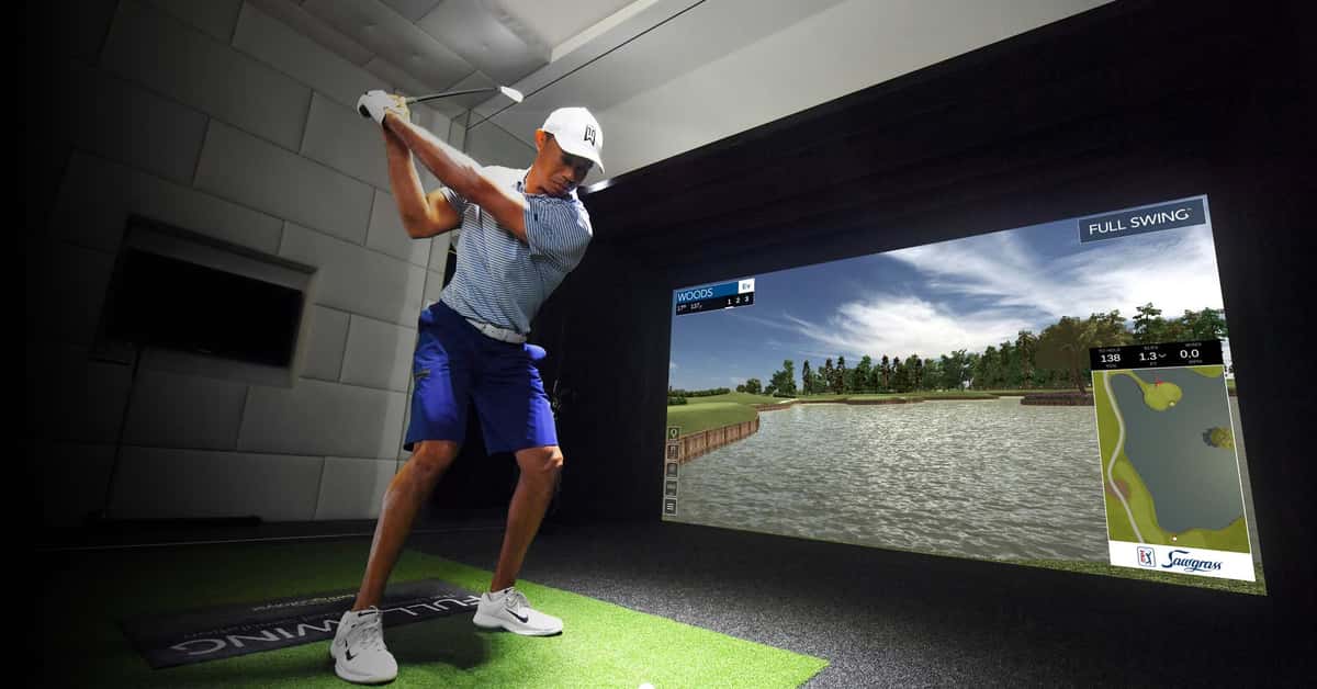 tiger woods swinging a golf club