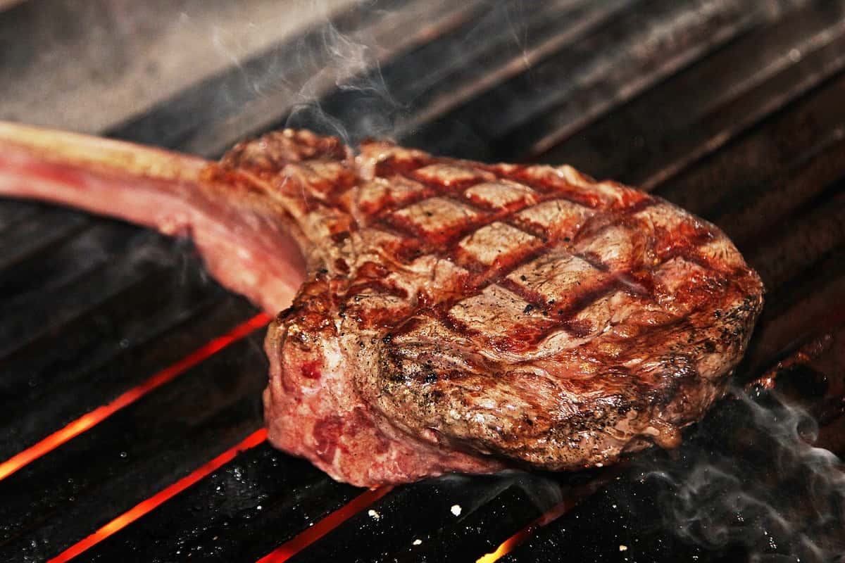 steak on hot grill