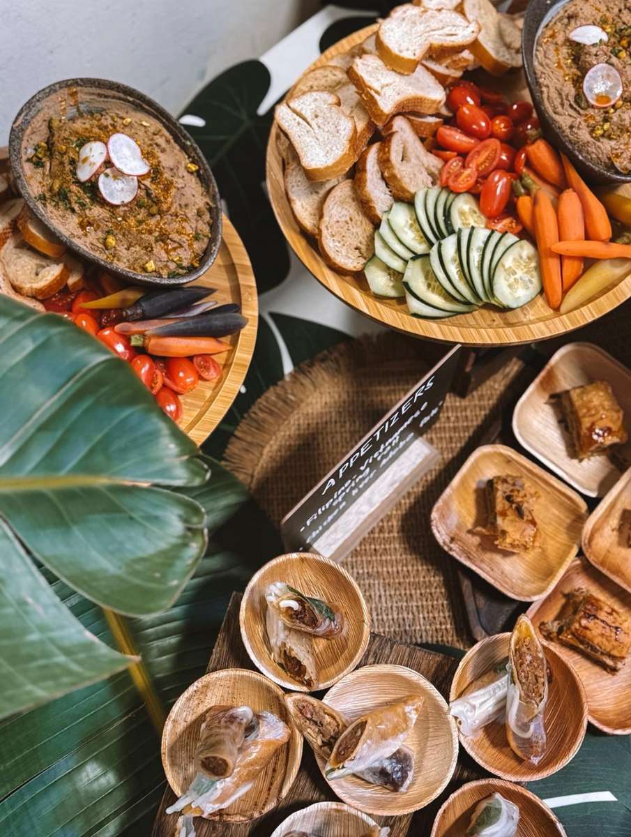 Variety of traditional Filipino dishes set up for an event