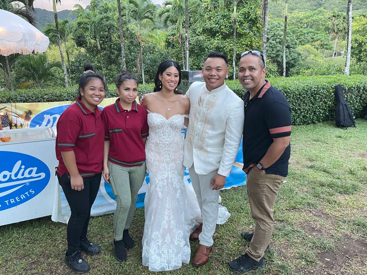 Bride and Groom with Magnolia Catering staff