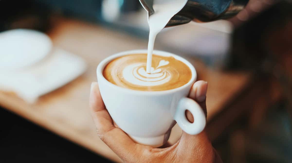 Barista making latte art
