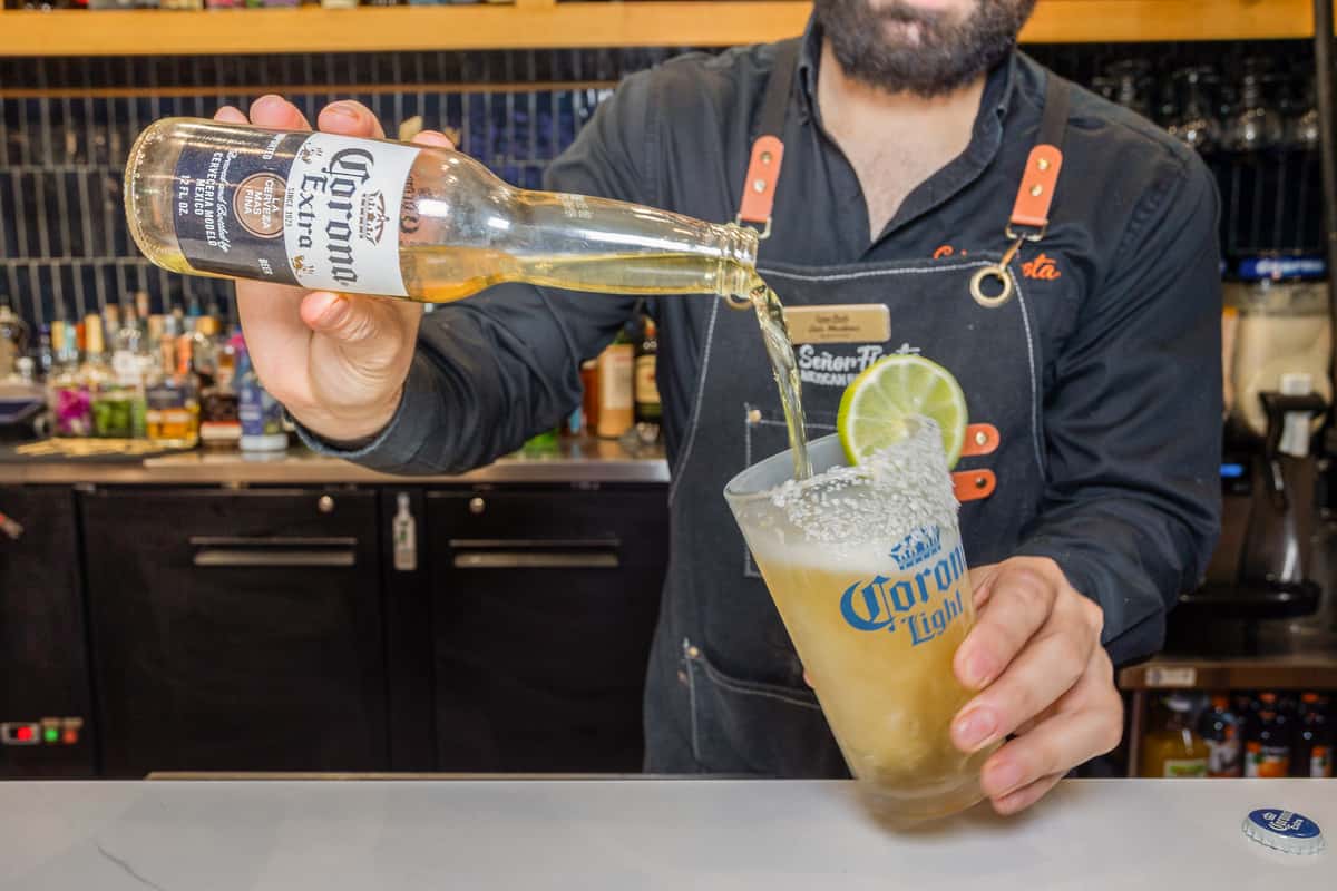 A man preparing a drink