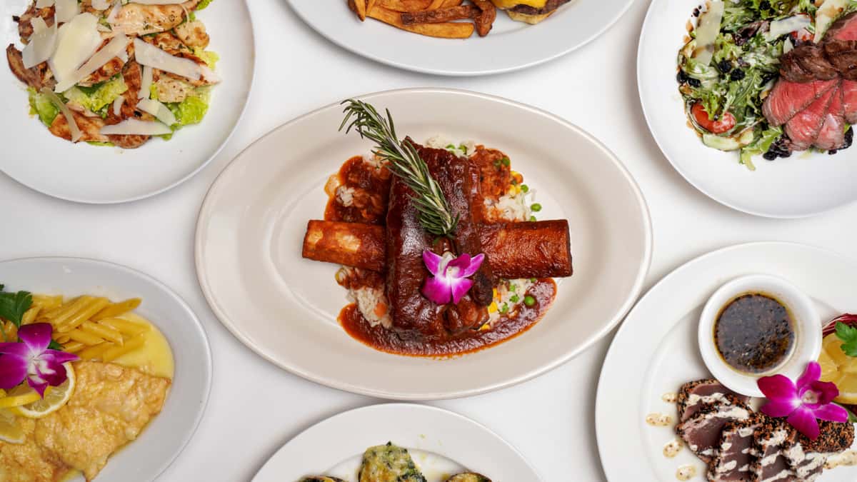 Hero image of table set up for food, catering at Empire Hawaii