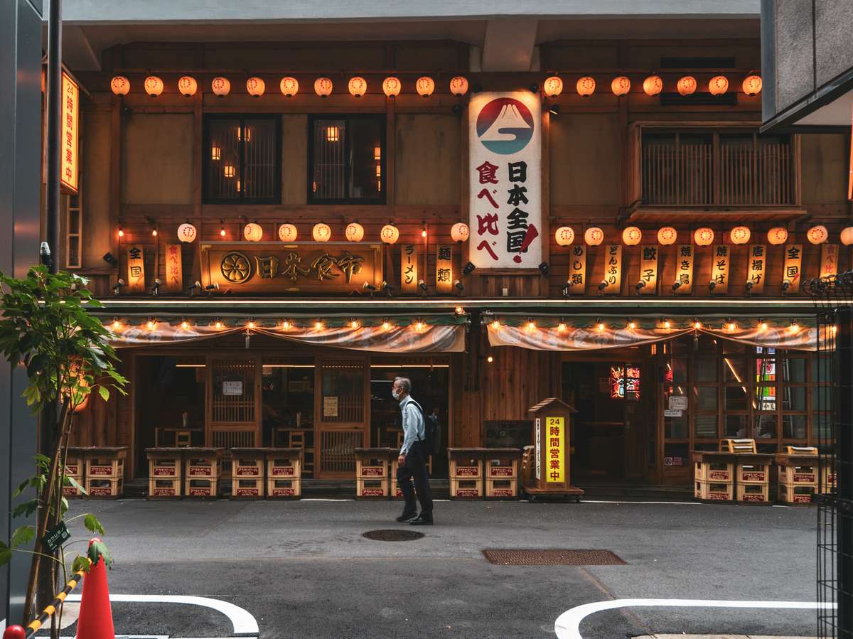 A Japanese themed restaurant being a central point on an empty street
