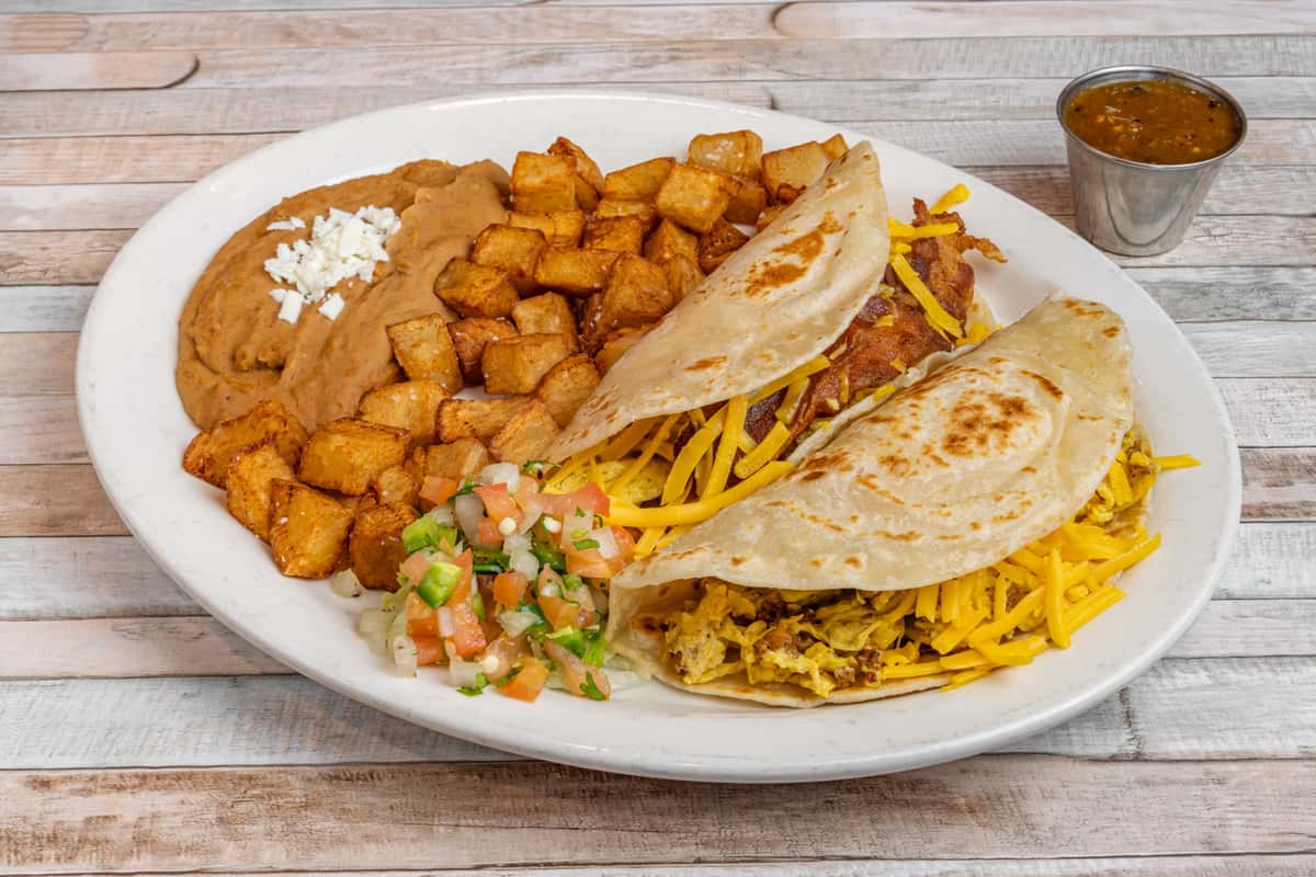 Breakfast tacos with potatoes and refried beans