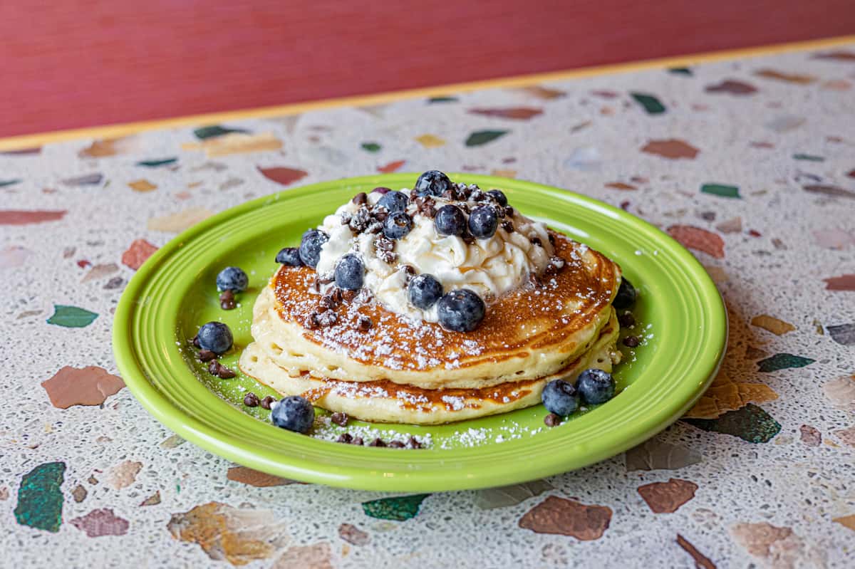 pancakes with blueberries and whipped cream